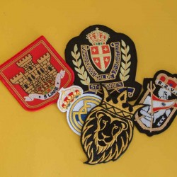 Custom Embroidered Badges and Patches with Metallic Yarn Custom Embroidered Badges and Patches with Metallic Yarn